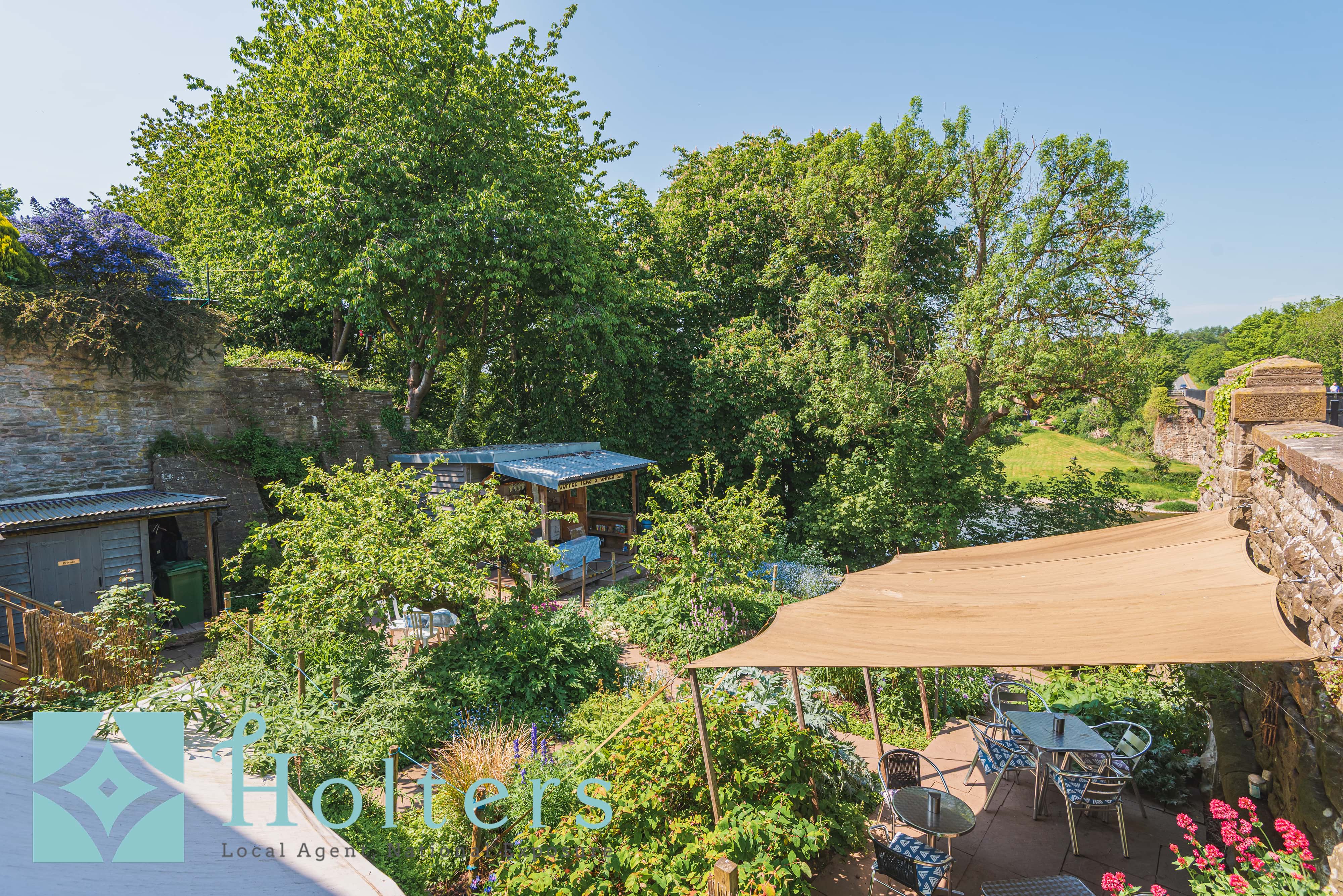 Garden terrace with sun shade